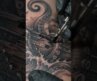 Hyper-Realistic Octopus Shipwreck Tattoo.