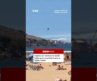 Fighter jet swerves to avoid birds near crowded beach in Gijón, Spain. #Spain #BBCNews